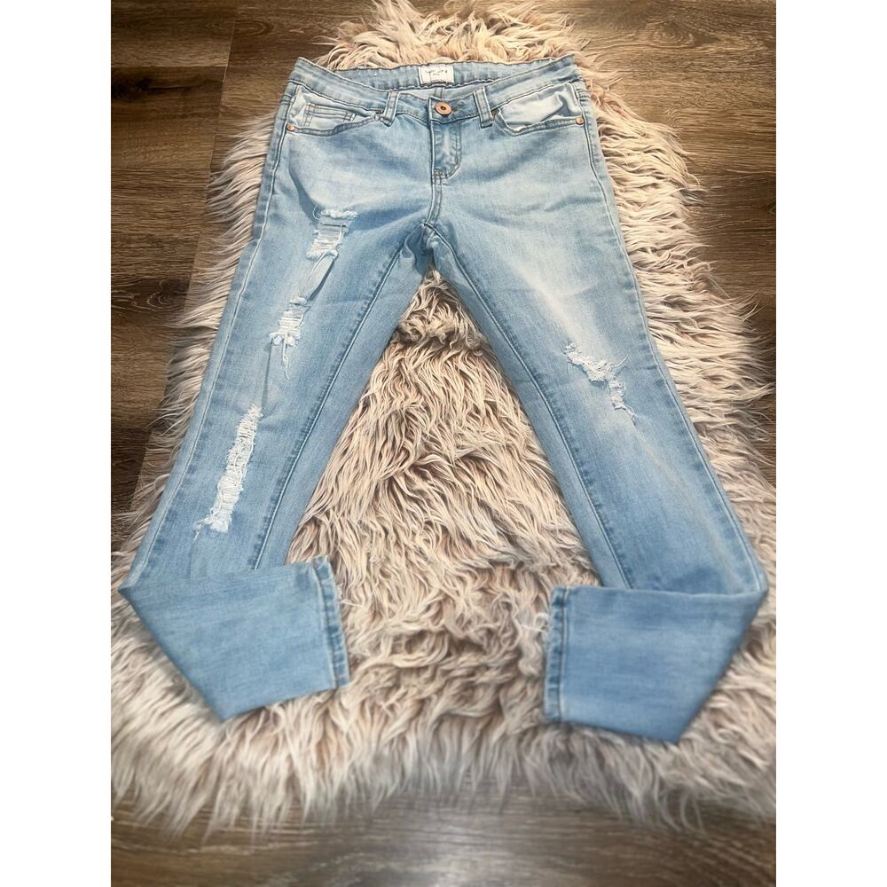 Gogo women’s distressed blue jeans